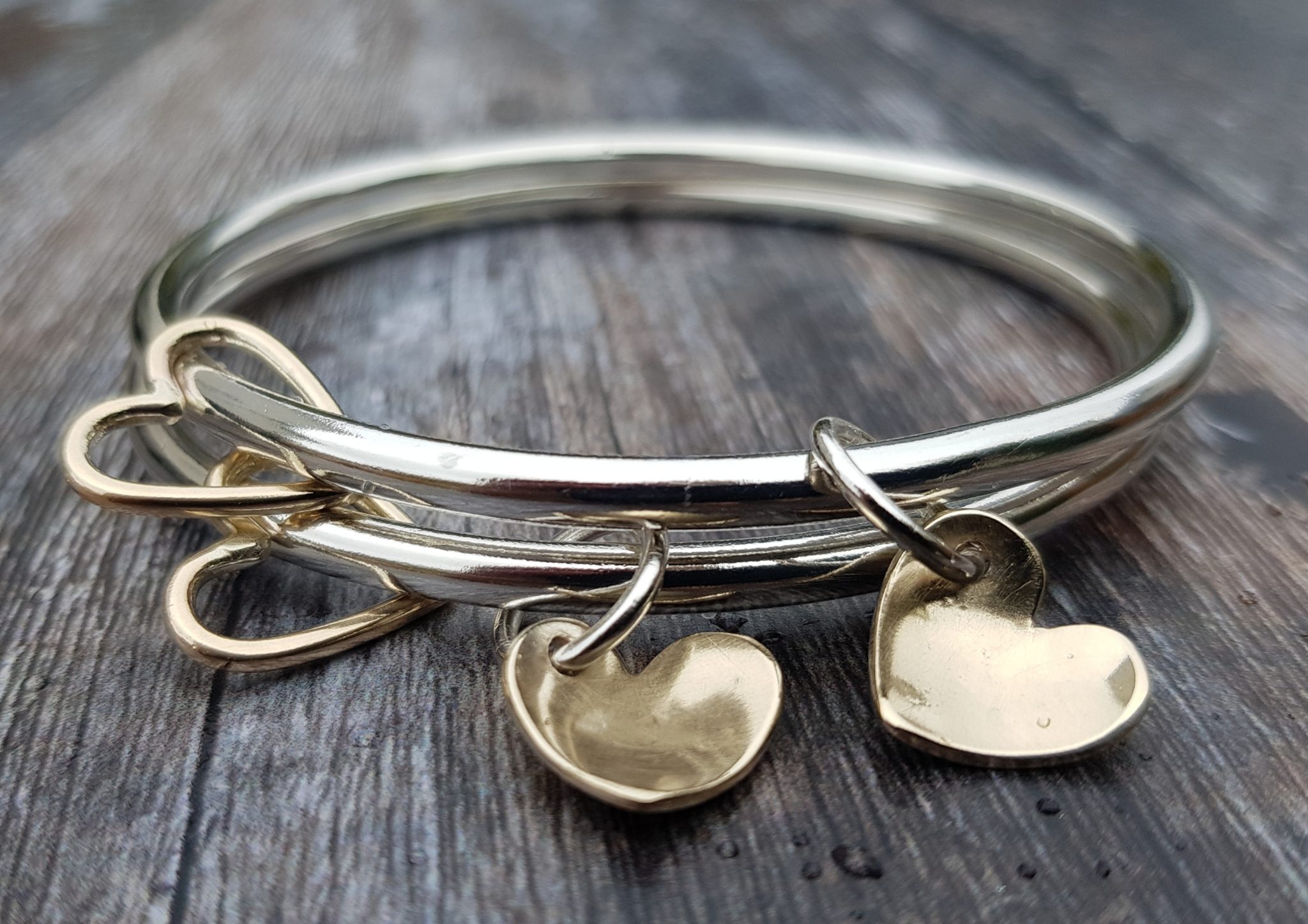 Two Chunky Bangles with Solid 9ct Gold charms Silverpickle