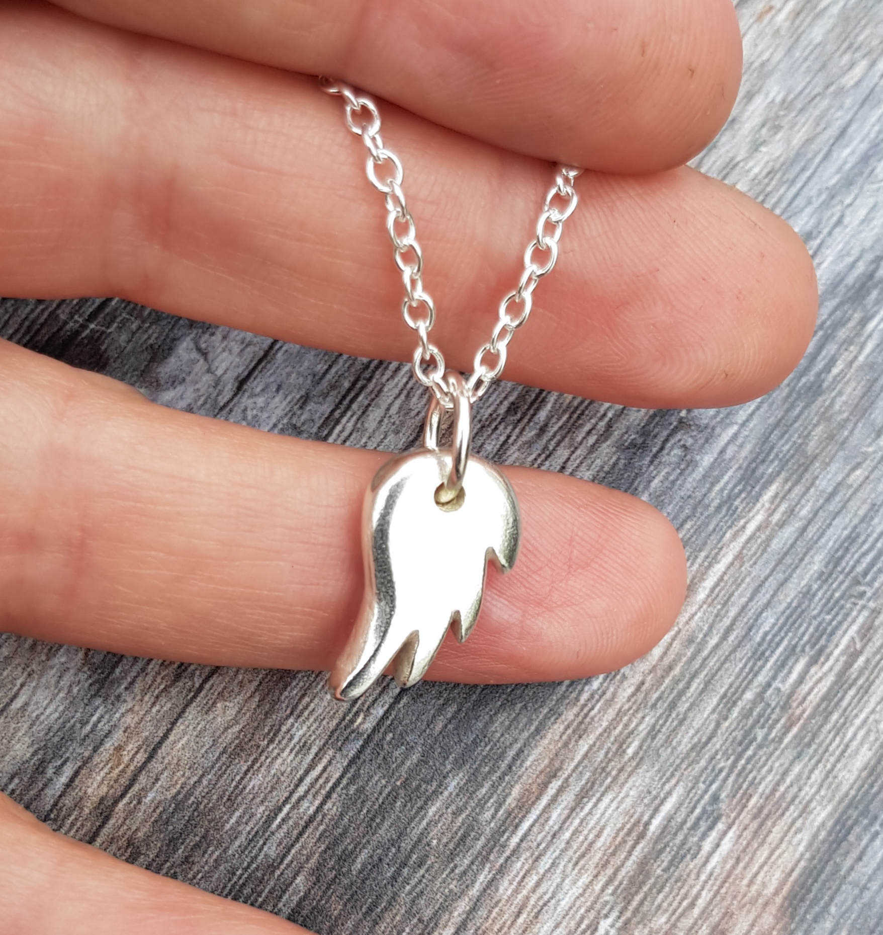 Small angel on sale wing pendant